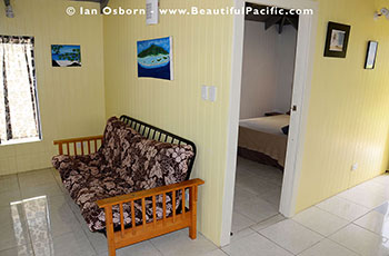 the lounge of the bungalow looking in to the bedroom