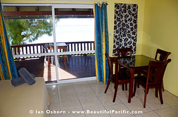 interior of the Studio Unit showing kitchen table looking out to the lagoon